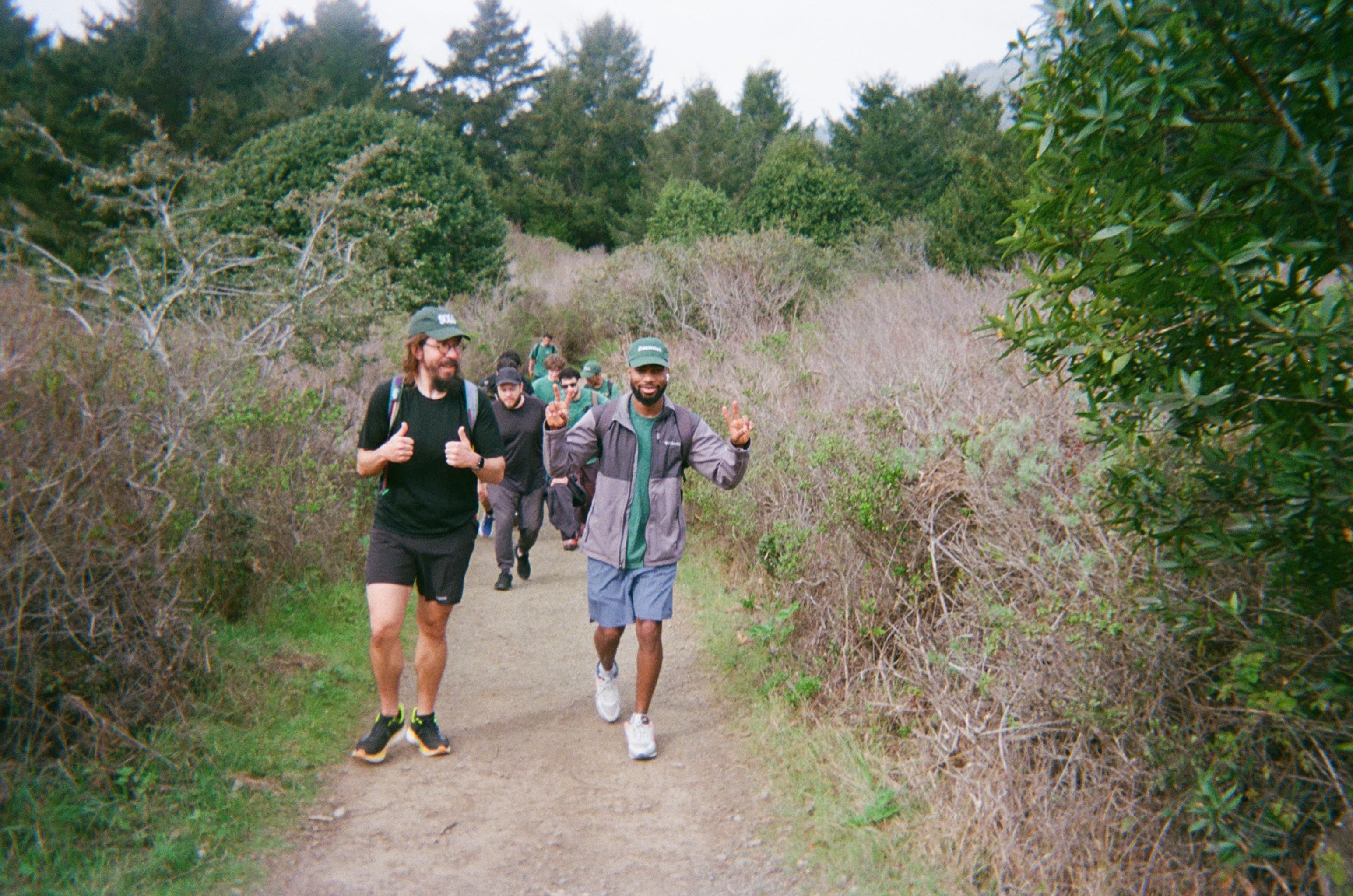 Solo founders walking together on a trail