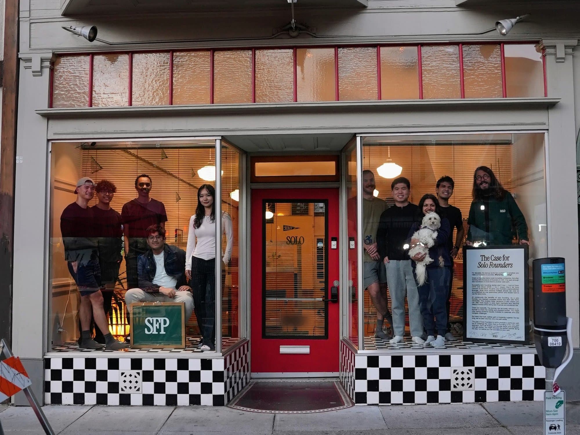 Founders standing in the windows of the Solo Founders storefront in San Francisco