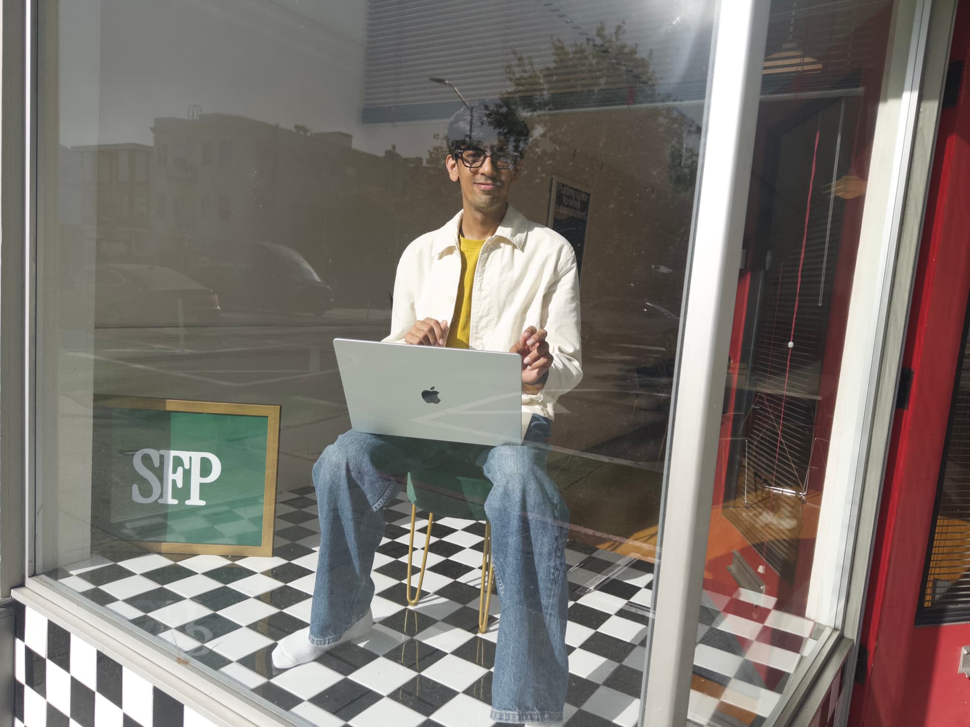 Founder working in the SFP storefront window